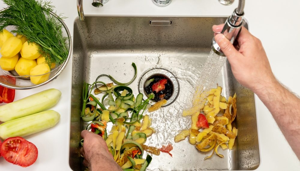 The Right Way to Clean and Deodorize a Smelly Garbage Disposal