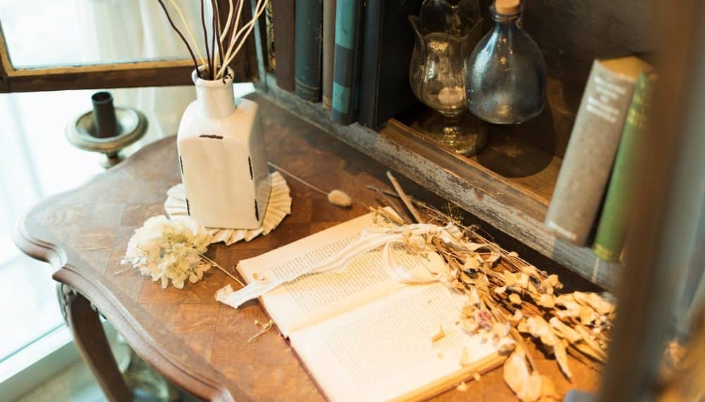 How to Style a Bookshelf Like a Designer Using What You Own